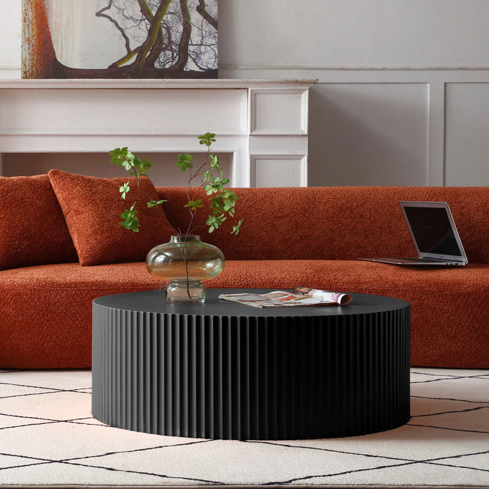 Sleek And Modern Round Coffee Table With Eye - Catching Relief Design, Black