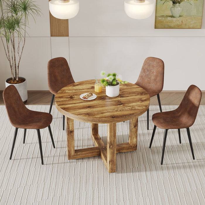A Modern And Practical Circular Dining Table. Made Of MDF Tabletop And Wooden MDF Table Legs A (Set of 4) Brown Cushioned Chairs