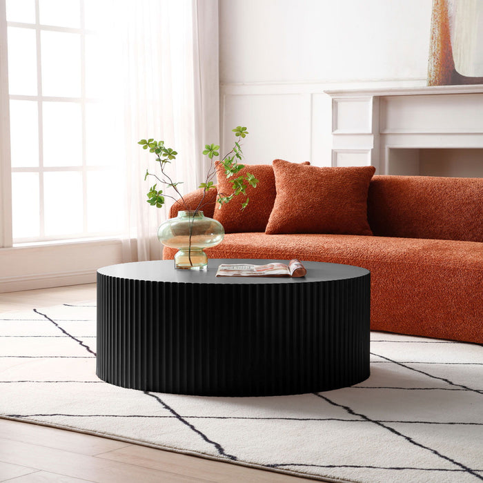 Sleek And Modern Round Coffee Table With Eye - Catching Relief Design, Black