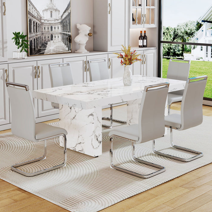 One Piece Of White MDF Material With Patterns On The Dining Table. 6 PU Synthetic Leather High Backrest Cushioned Side Chairs With C-Shaped Silver Metal Legs