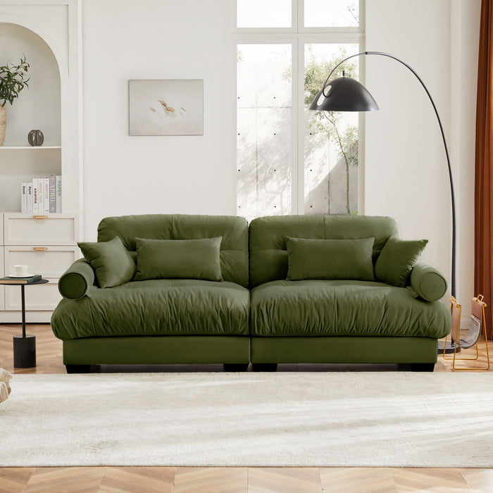Modern Velvet Sofa With Bolstered Armrests And Pillows