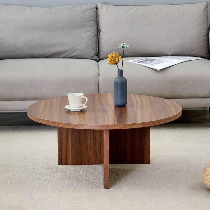 Versatile Round Coffee Table For Various Interior Styles