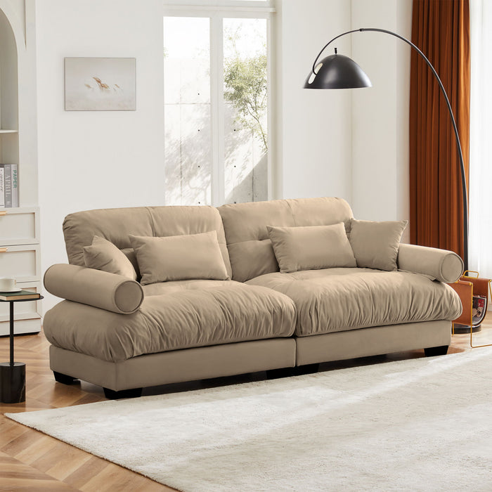 Modern Velvet Sofa With Bolstered Armrests And Pillows