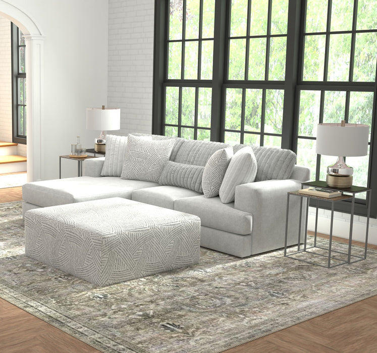 Logan - Upholstered Sectional With Comfort Coil Seating - 46" Cocktail Ottoman And Accent Pillows Included