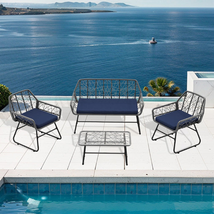 4 Piece Wicker Patio Furniture Set With Tempered Glass Table And Detachable Cushions
