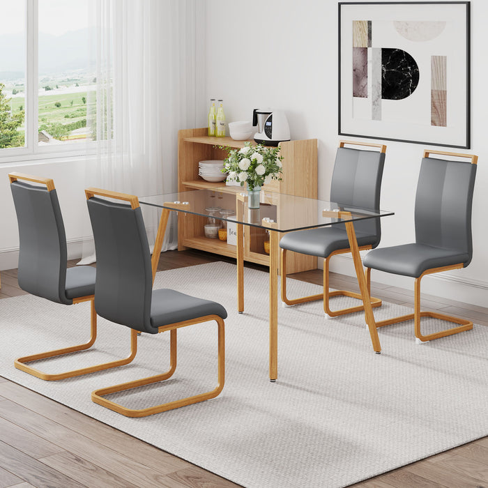 Table And Chair Set 1 Table And 4 Grey Chairs Glass Dining Table With Tempered Glass Tabletop And Wood Color Metal Legs PU Leather High Back Upholstered Chair With Wood Color Metal Leg