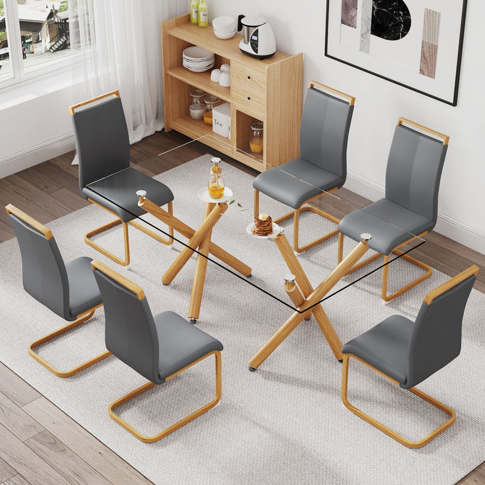 1 Table And 6 Chairs Glass Dining Table With Tempered Glass Tabletop And Wooden Metal Legs Grey PU Leather High Backrest Soft Padded Side Chair With Wooden Color C Shaped Tube Chrome Metal Leg