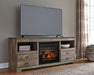 Trinell - Brown - 63" TV Stand With Glass/Stone Fireplace Insert Unique Piece Furniture