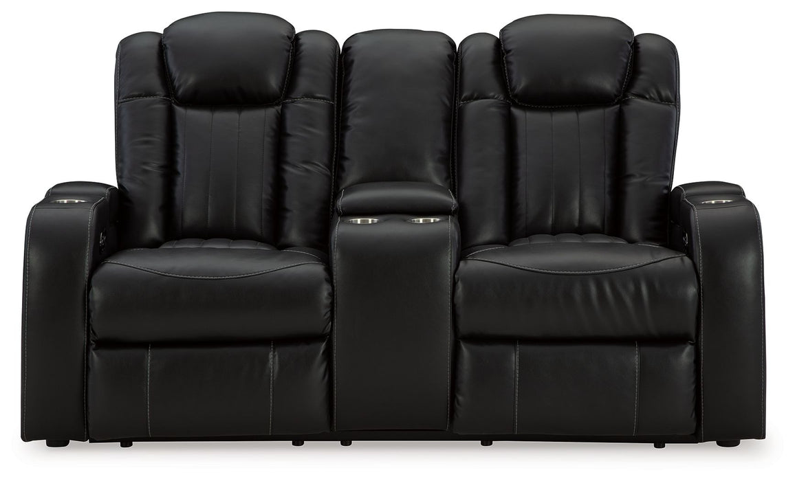 Caveman Den - Power Reclining Loveseat with Console/ Adj Hdrst - Midnight