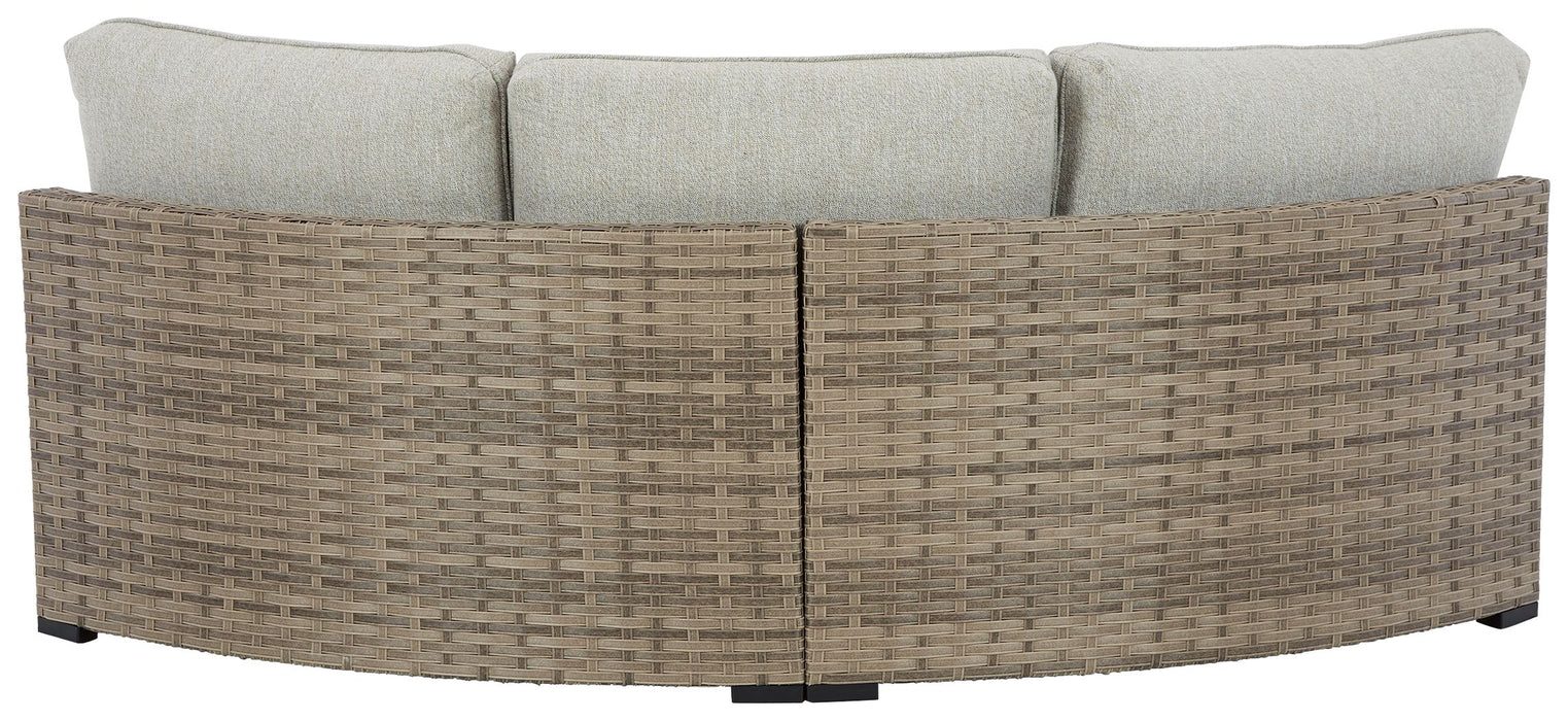 Calworth - Beige - Curved Loveseat With Cushion Unique Piece Furniture
