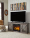 Wynnlow - Gray - TV Stand With Faux Firebrick Fireplace Insert Unique Piece Furniture